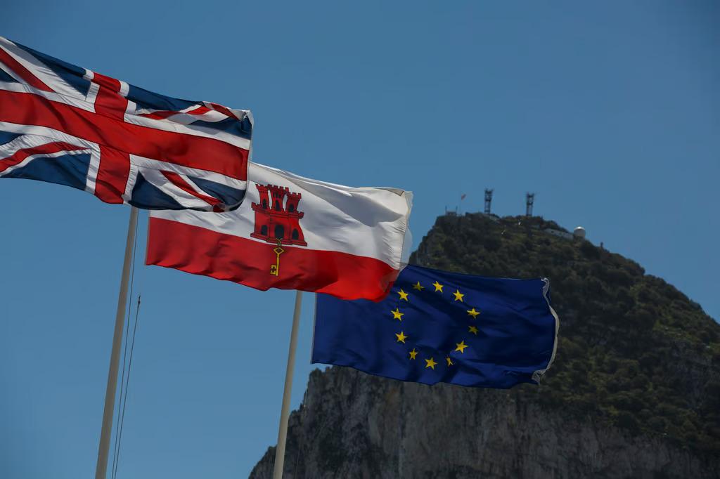 UK, Gibraltar, and EU flags