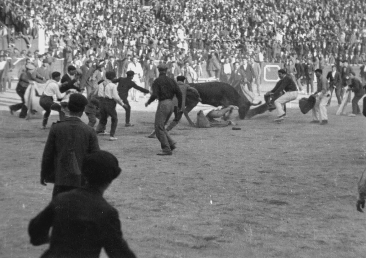 Ernest Hemingway participating in a bullfight in Pamplona, 1925