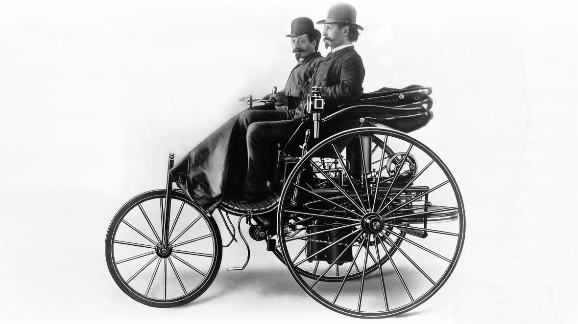 Carl Benz at the wheel of his patent motor car